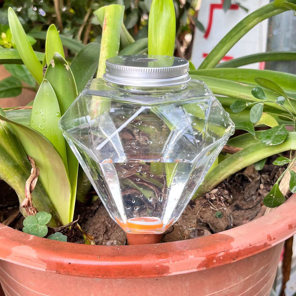 1pcs Cute Plastic Watering Mac - Automatic Plant Waterer recension och pris