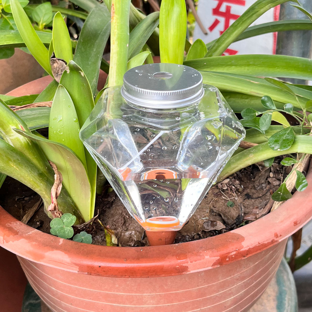1pcs Cute Plastic Watering Mac - Automatic Plant Waterer recension och pris