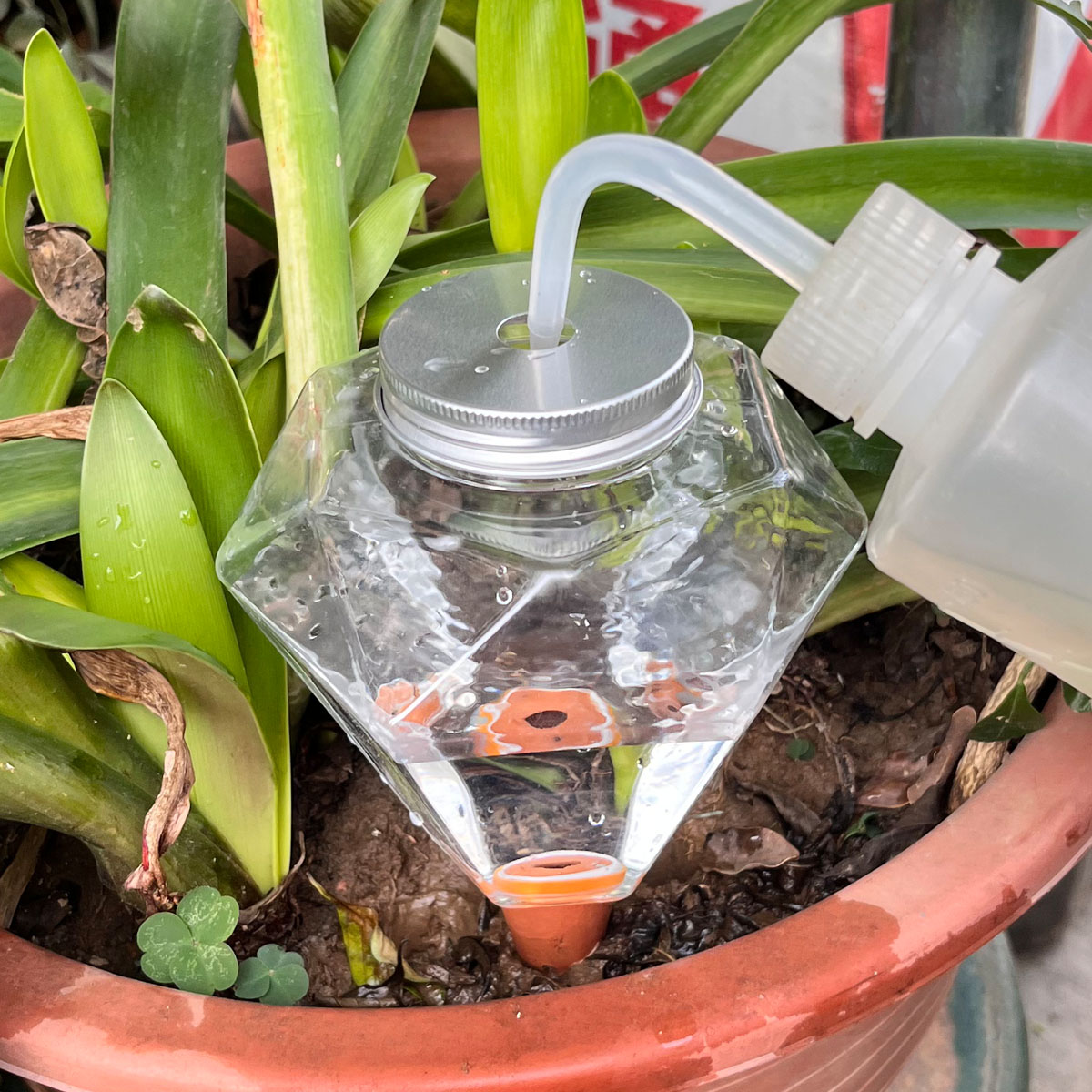 1pcs Cute Plastic Watering Mac - Automatic Plant Waterer recension och pris
